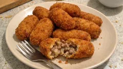 Croquetas caseras de carne de cocido: cremosas por dentro y crujientes por fuera